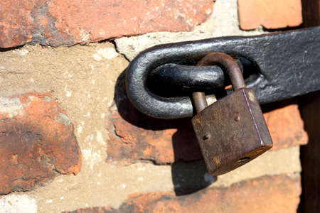 Big old rusty close padlock security protection