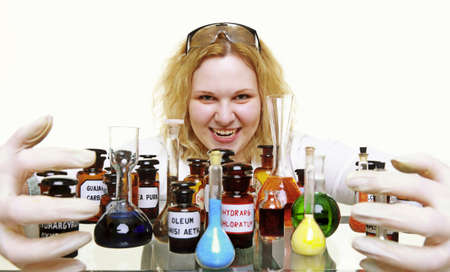 Crazy chemist woman or girl student or female laboratory assistant or scientific researcher with...