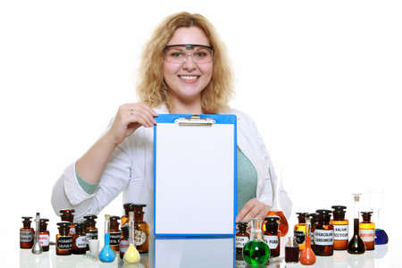 chemist woman or girl student or female laboratory assistant or scientific researcher with chemical glassware test flask, clipboard with blank. Isolated on white backgroundの写真素材