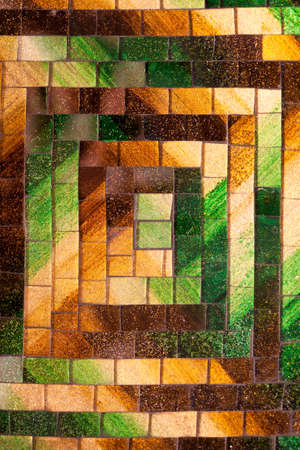 Abstract colorful rectangle glass mosaic background green and brown tone with block patternの写真素材