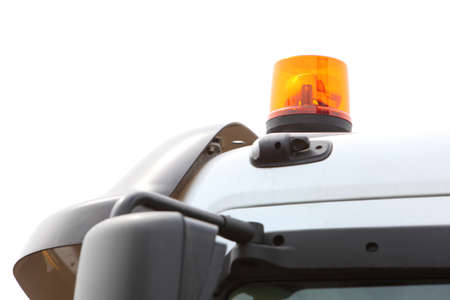 Orange siren signal lamp for warning, flashing light on vehicle, industry detailの写真素材
