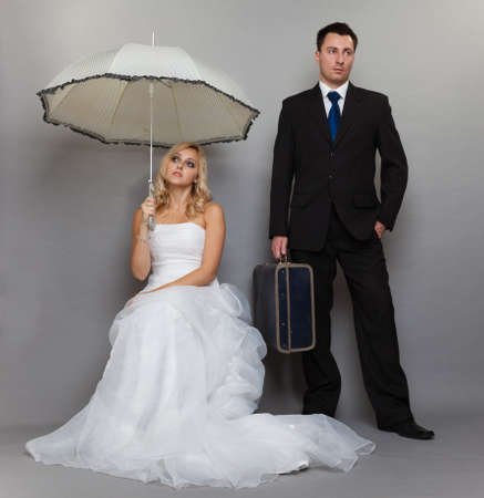 Bad relationship concept - married couple problem indifference depression and discord. Man woman in disagreement. retro style gray backgroundの写真素材