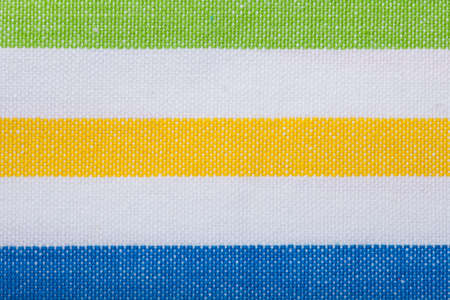 Closeup of colorful horizontal striped fabric textile as background texture or pattern  Macro  