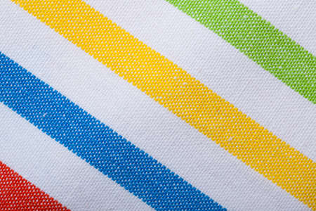 Closeup of colorful striped fabric textile as texture or pattern. Macro.の写真素材