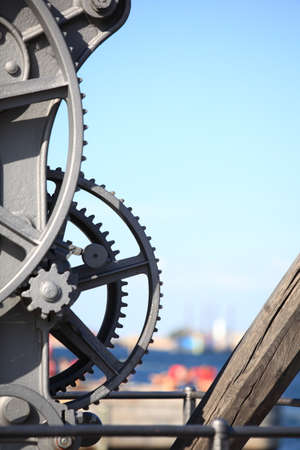 Close up steel cog wheels metal gears mechanical ratchets machine part, industry detailの写真素材