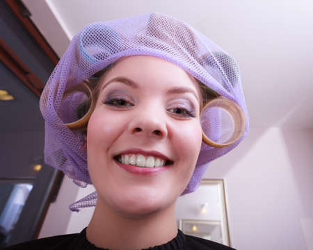 portrait of funny happy woman in beauty salonの写真素材