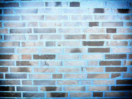 Gray blue brick wall texture pattern grunge background with vignette