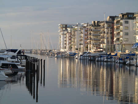 MALMO, SWEDEN - AUGUST 7   Yachts and modern houses in marina on August 7, 2013 in a gulf of Malmo, Sweden のeditorial素材