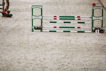 Equitation  Green red white obstacle for jumping horses  Riding competition  Real の写真素材