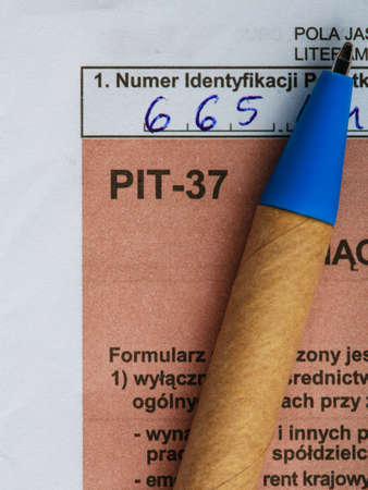 Filling in polish individual income tax form PIT-37 for year 2013の写真素材