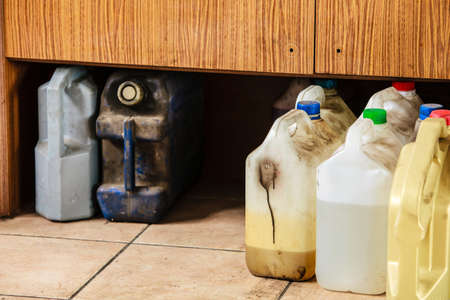 plastic containers oil can grunge bottles and tanks in mechanic garage car service