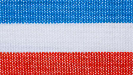 Closeup of blue red white horizontal striped fabric textile as background texture or pattern  Macro の写真素材