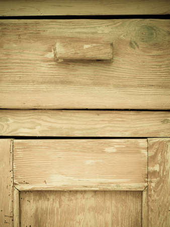 Furniture part. Retro style. Closeup of vintage wooden kitchen cabinet or cupboard as background.の写真素材