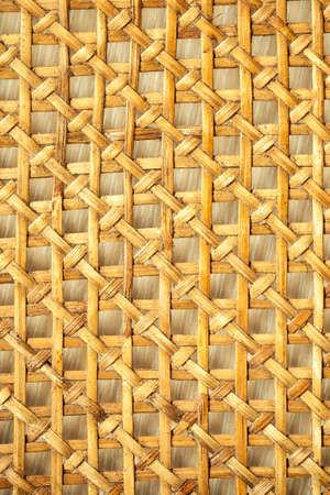 Closeup of beige basket. Wicker woven pattern for abstract background or texture