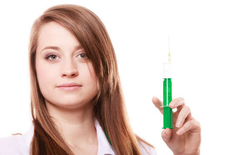 Woman in lab coat  Doctor with syringe wants to do injection isolated on white  Medical person for health insurance の写真素材