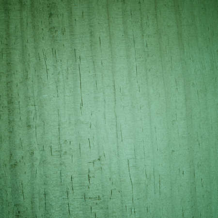 Wood. Closeup of green wooden wall  with vignette as background or textureの写真素材