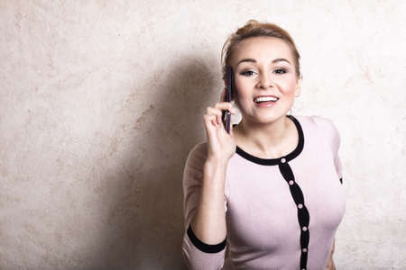 Portrait of modern businesswoman woman fashionable girl talking on the mobile phone smartphone....