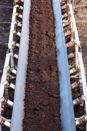 Open pit. Opencast brown coal mine. Belt conveyor as industrial detail.の写真素材