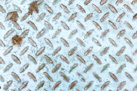 closeup of metallic dirty rusty surface texture background  industrial floor  old iron metal construction の写真素材
