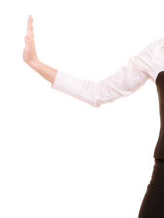 Business. Hand of businesswoman pushing away virtual problem blank copy space isolated on white. Female palm moving invisible obstacle.の写真素材