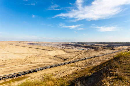 Open pit. Opencast brown coal mine. Belt conveyor as industrial detail.の写真素材