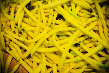 food background  closeup on vegetable yellow green beans  healthy produci in grocery store