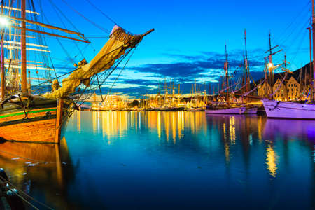 Sailing ships in the harbour during the tall ships races Bergen, Norway. Night viewの写真素材