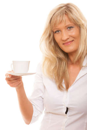  People, happiness, drink and food concept. Mature woman drinking tea or coffee. Cup of Hot Beverage. white backgroundの写真素材
