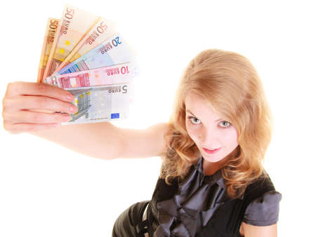 Rich happy blonde business woman showing euro currency money banknotes. Economy, finance and business work.の写真素材