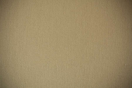 Art and painting. Closeup of brown beige canvas surface as background texture or pattern.