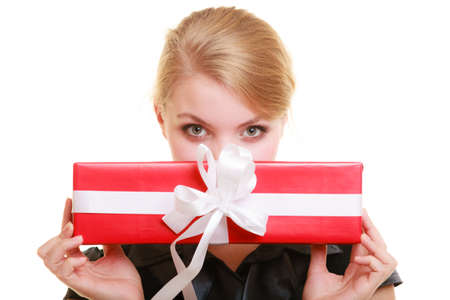Holidays love and happiness concept - beautiful blonde girl with red gift box isolated