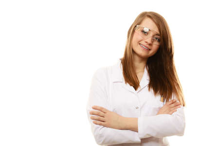 Experiments in laboratory. Chemist woman or girl student of chemistry or scientific researcher in goggles glasses isolated.の写真素材