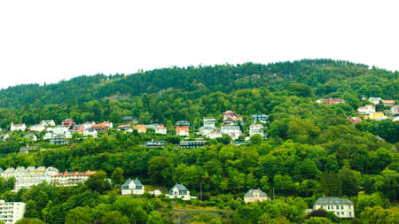 Tourism and travel. Cityscape town houses on hills in city Bergen, Norway Europe.の写真素材
