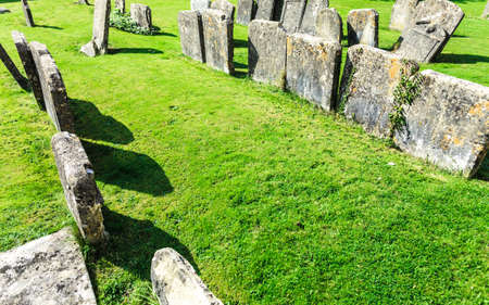 BIBURY, ENGLAND, UK - SEPTEMBER 21, 2014: graveyard in St Mary Parish Church in Bibury in Cotswold district on September 21, 2014, England.のeditorial素材