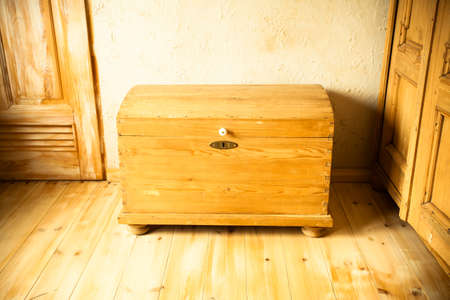 Retro style. Old wooden chest like treasure box in the attic. Interior.の写真素材