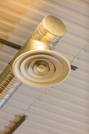 electric lamps on celling indoor. Industry detail. Light power and energy.