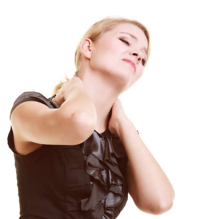 Backache. Young businesswoman woman blonde girl suffering from back or neck pain isolated on white.の写真素材