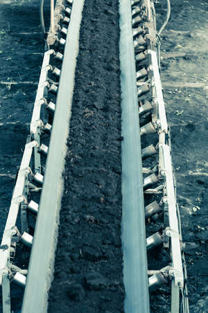Open pit. Opencast brown coal mine. Belt conveyor as industrial detail.の写真素材