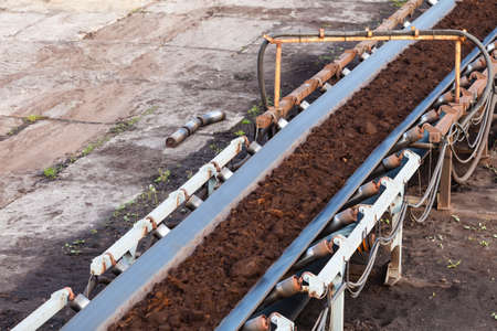 Open pit. Opencast brown coal mine. Belt conveyor as industrial detail.の写真素材