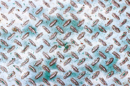 closeup of metallic dirty rusty surface texture background. industrial floor. old iron metal construction.の写真素材