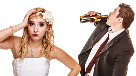 Wedding couple, unhappy bride with alcoholic drinking groom. Woman looking her future make decision...