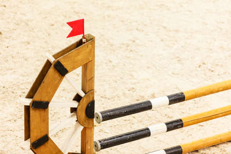 Equitation. Obstacle for jumping horses. Riding competition.の写真素材