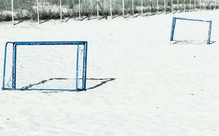 Summer vacation, active lifestyle concept. Football gate on sandy beach soccer goalの写真素材