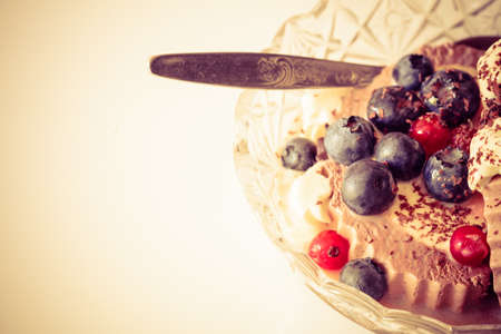 ice cream dessert decorated with berry fruit