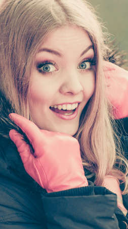 Portrait of pretty smiling fashionable woman in fall forest park. Happy gorgeous blonde young girl...