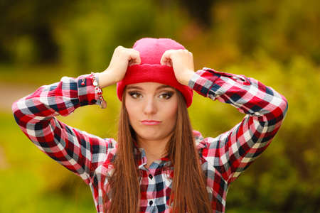 Fall lifestyle concept, harmony freedom. Beauty young woman fashion girl casual style relaxing walking in autumnal park, outdoorの写真素材