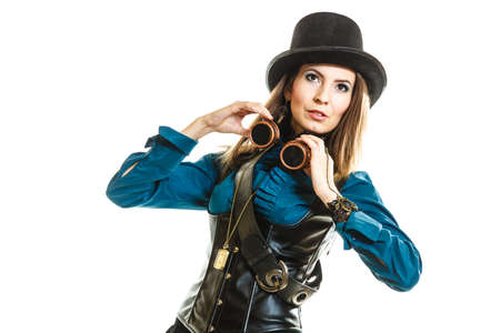 Beauty and fashion - retro style. Vintage pretty woman in black hat topper and old goggles isolated on white.の写真素材