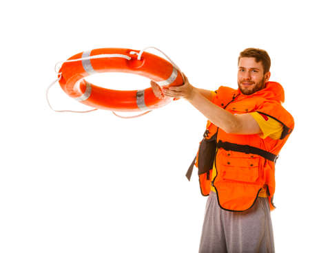 Lifeguard in life vest jacket with ring buoy lifebuoy. Man supervising swimming pool water. Accident prevention.の写真素材