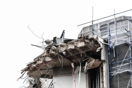 Urban scene. Dismantling of a house. Ruins of building under destruction. Industry.の写真素材
