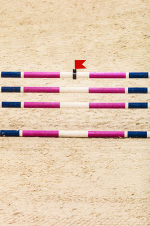 Equitation. Obstacle for jumping horses. Riding competition.の写真素材
